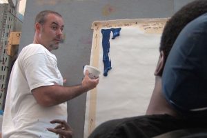 Artist engaged in Traditional Painting with Facilitator Joseph Matousek in the art studio at the Robert Schonhorn Arts Center.