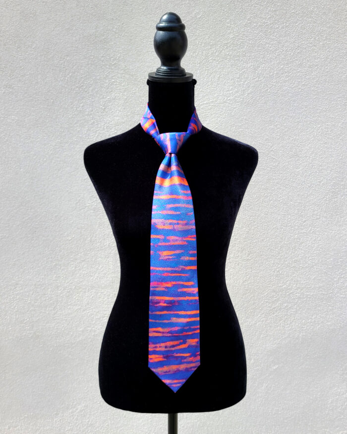 Silk tie based on a painting by artist Thomas Christian titled "Held Between Bars".