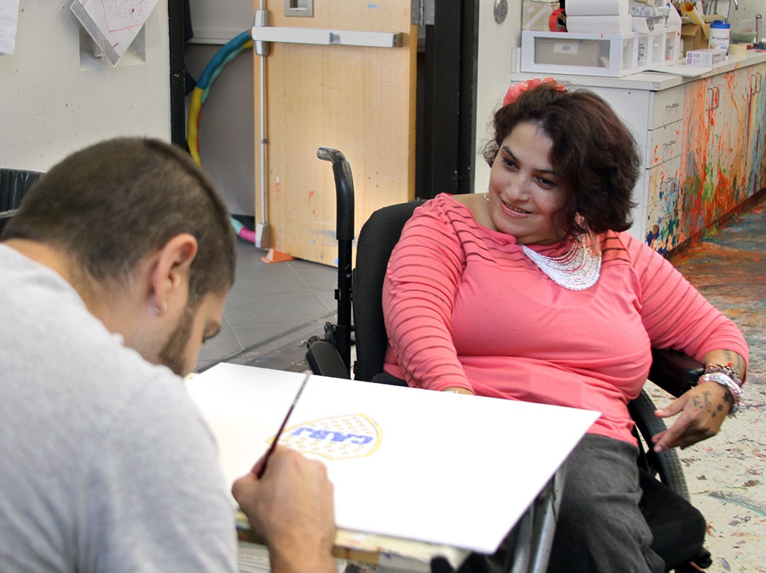 Artist Isabell Villacis at work in the art studio at the Robert Schonhorn Arts Center.