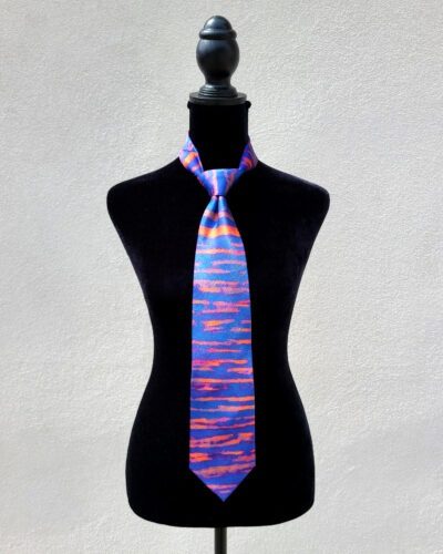 Silk necktie based on artist Thomas Christian's painting titled "Held Between Bars".