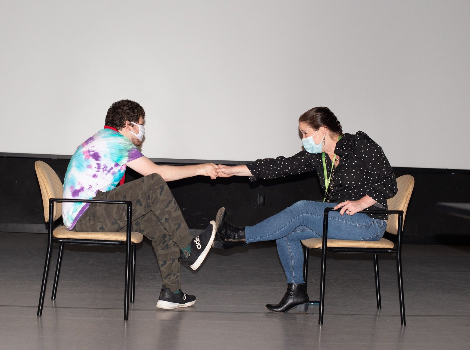 Artist George Hoehn and Performing Arts Coordinator Heather Williams on stage at the Robert Schonhorn Arts Center.