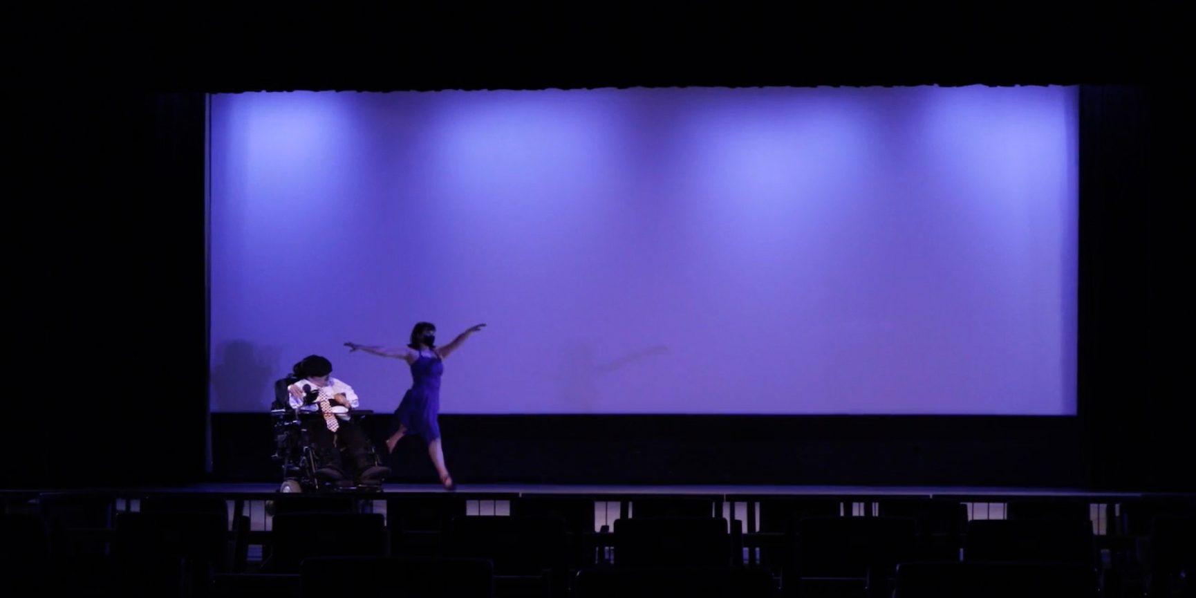 Choreographer Josh Handler performing his work on stage with Dance Facilitator Alyssa Thostesen at River Dance Festival 2023.