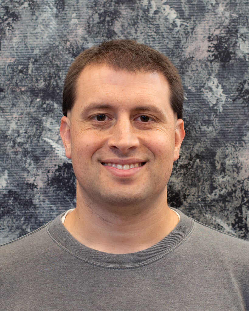 Headshot of artist Chris Palmer