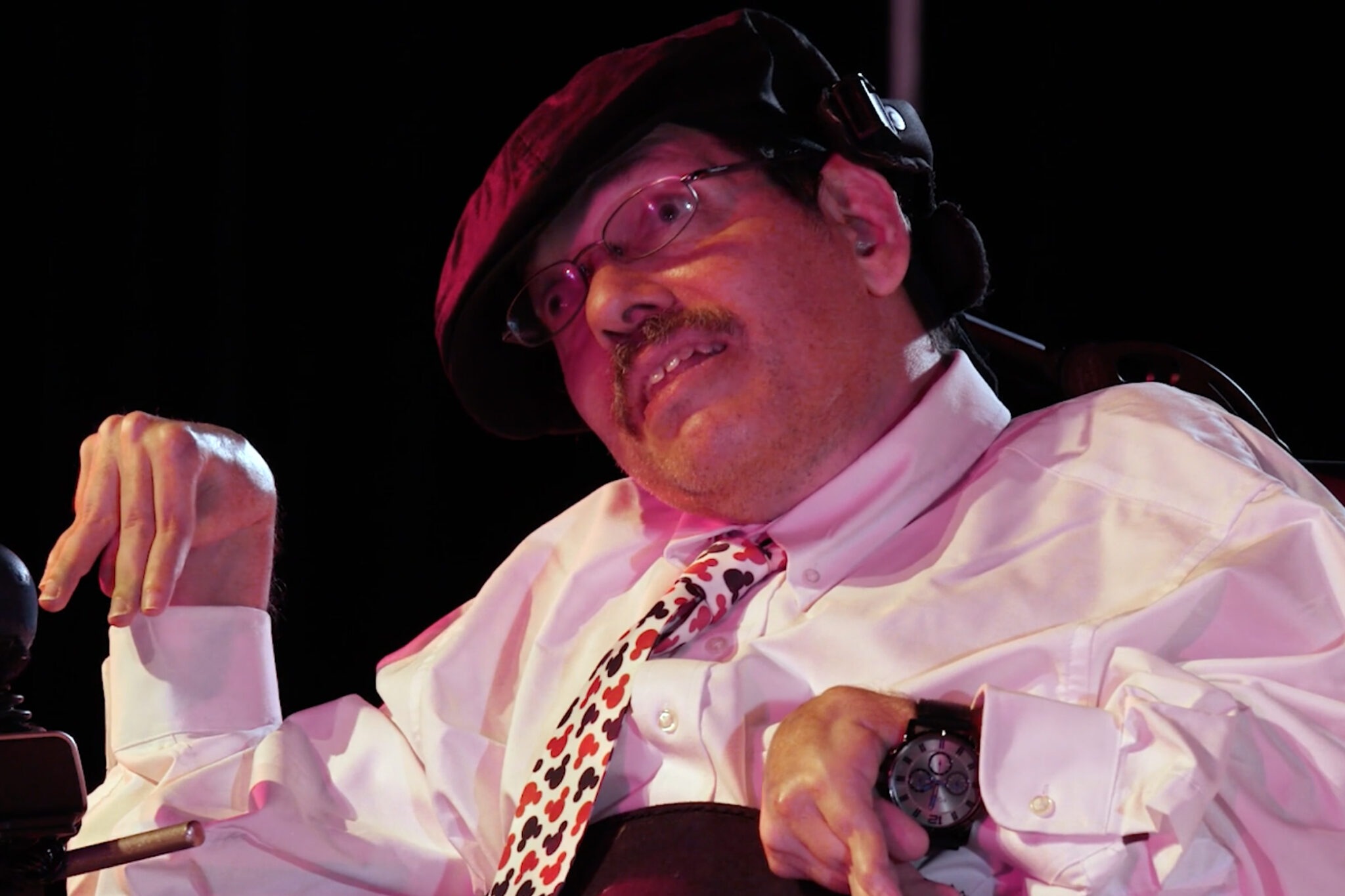 Headshot of artist Josh Handler performing.