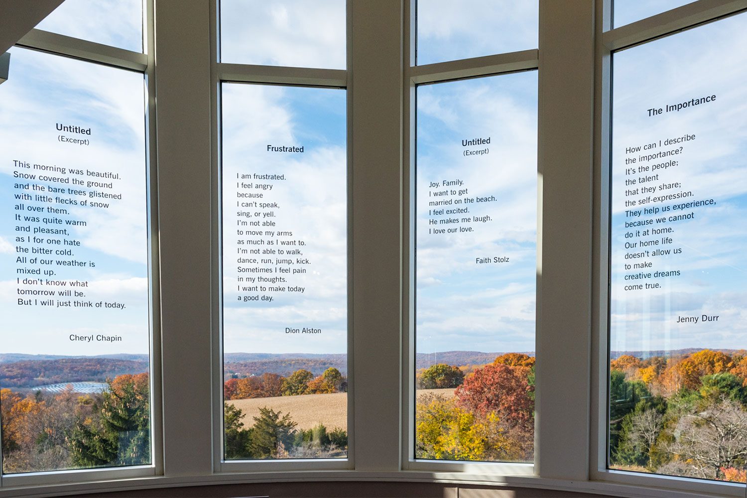 Robert Schonhorn main gallery featuring the creative writing on four windows by artists Cheryl Chapin, Dion Alston, Faith Stolz and Jenny Durr.