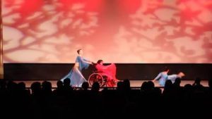 Artist Isabell Villacis performing on stage at Robert Schonhorn Arts Center.