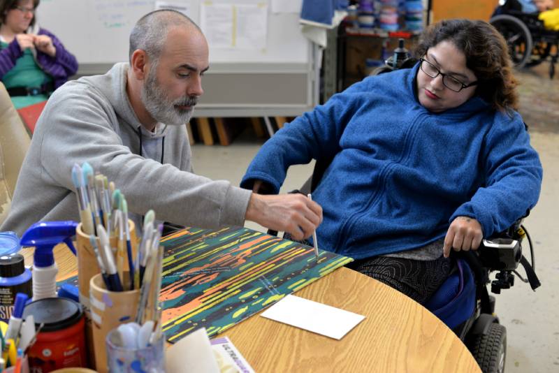 Artist Isabell Villacis at work in the art studio at the Robert Schonhorn Arts Center.