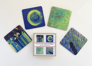 Arts Access coaster set based on artwork by program artists.