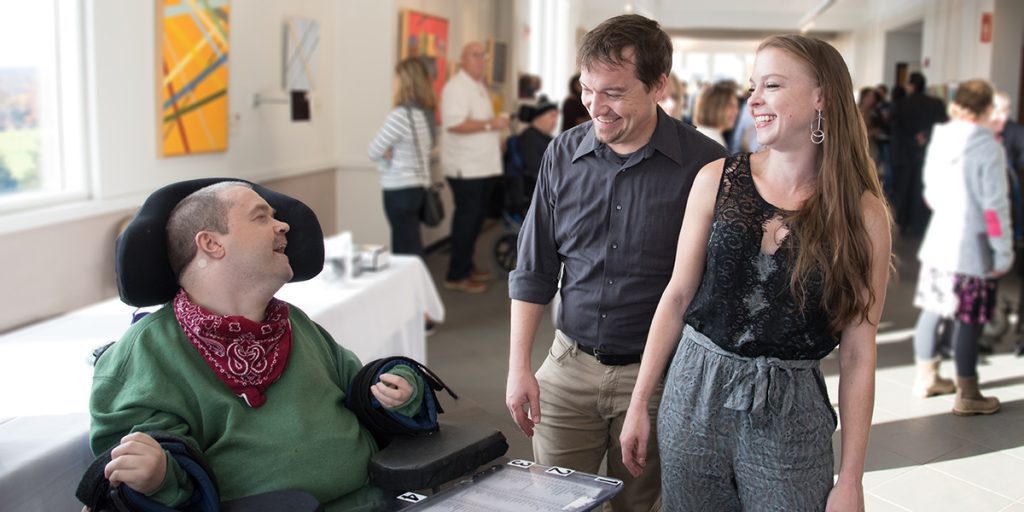 Artist Philip Fisher with guests in the Roberts Schonhorn Arts Center gallery at Full Circle 2018.