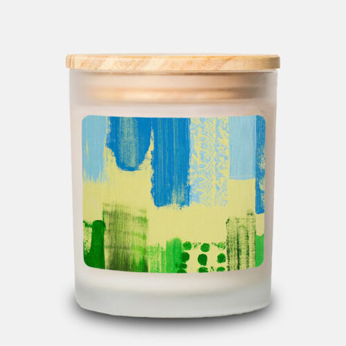 Frosted glass candle featuring artwork by Josh Handler.