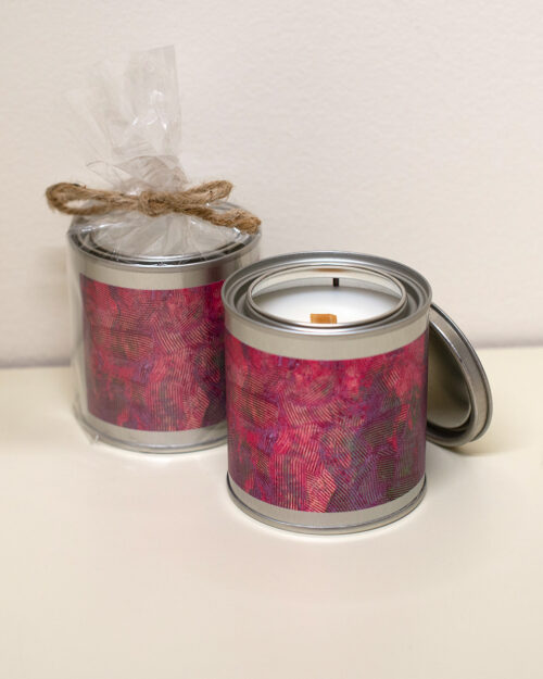 Paint can candle featuring artwork by Nancy Soto.