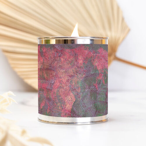 Paint can candle featuring artwork by Nancy Soto.