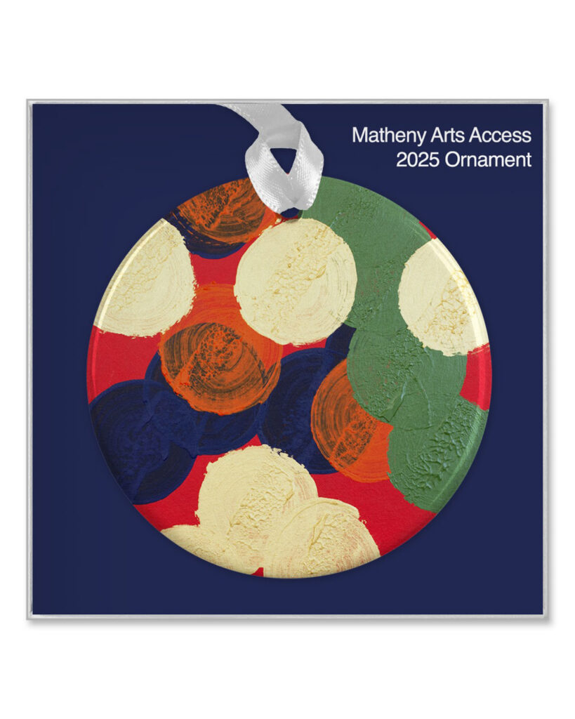 Round porcelain ornament featuring colorful abstract artwork by Phil Fisher.