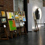 Arts Access paintings on display at Access-ABILITY 2020.